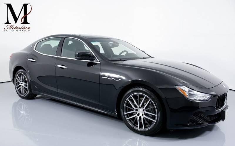Used 2015 Maserati Ghibli Base 4dr Sedan for sale Sold at Metrolina Auto Group in Charlotte NC 28217 - 1