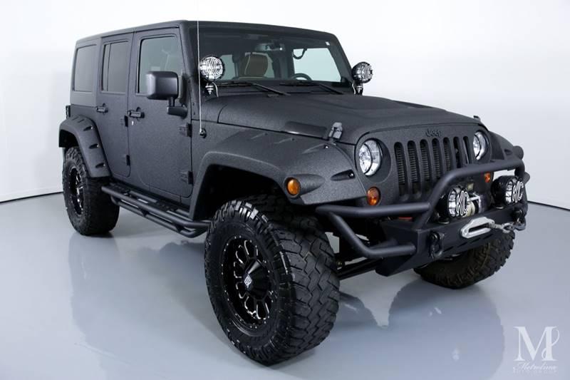 Used 2013 Jeep Wrangler Unlimited Sport 4x4 4dr SUV for sale Sold at Metrolina Auto Group in Charlotte NC 28217 - 2