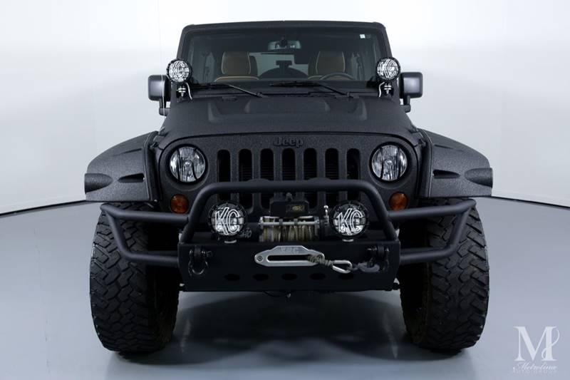 Used 2013 Jeep Wrangler Unlimited Sport 4x4 4dr SUV for sale Sold at Metrolina Auto Group in Charlotte NC 28217 - 3