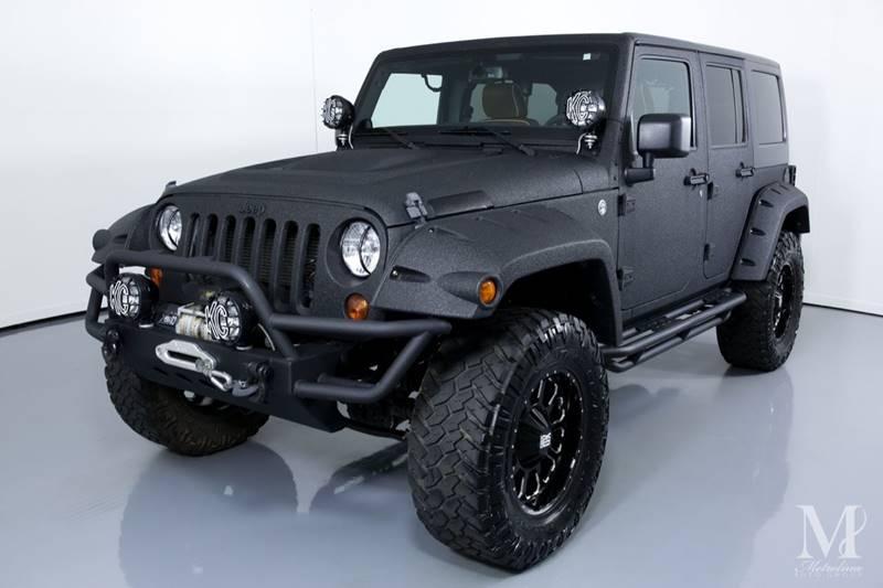 Used 2013 Jeep Wrangler Unlimited Sport 4x4 4dr SUV for sale Sold at Metrolina Auto Group in Charlotte NC 28217 - 4