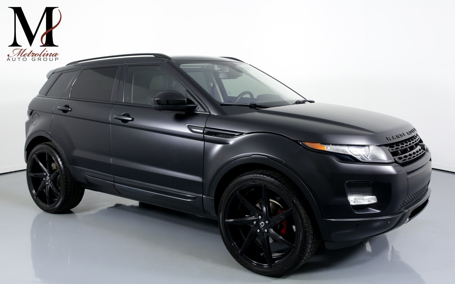 Used 2015 Land Rover Range Rover Evoque Pure Plus AWD 4dr SUV for sale $26,996 at Metrolina Auto Group in Charlotte NC 28217 - 1