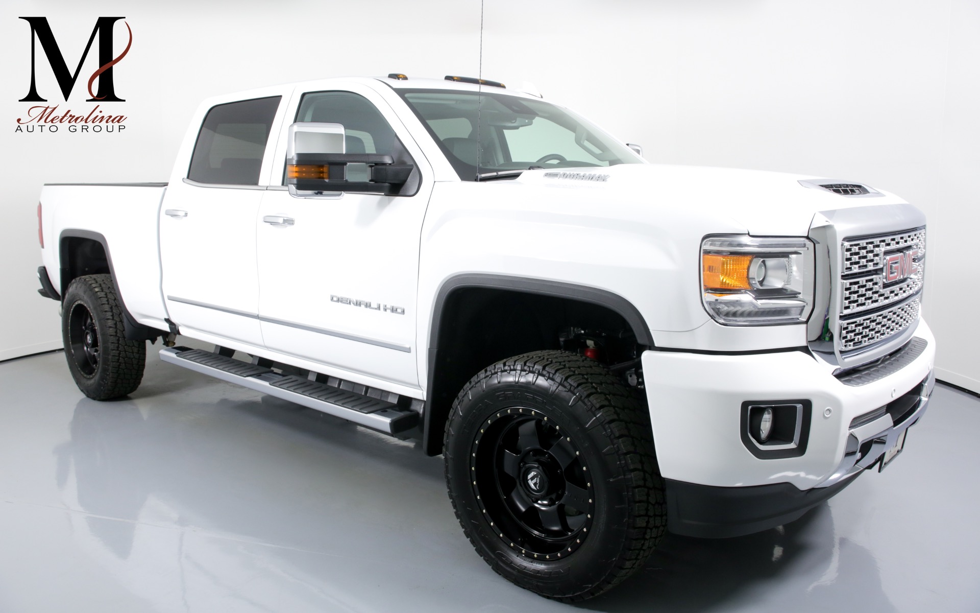 Used 2019 GMC Sierra 2500HD Denali for sale Sold at Metrolina Auto Group in Charlotte NC 28217 - 1