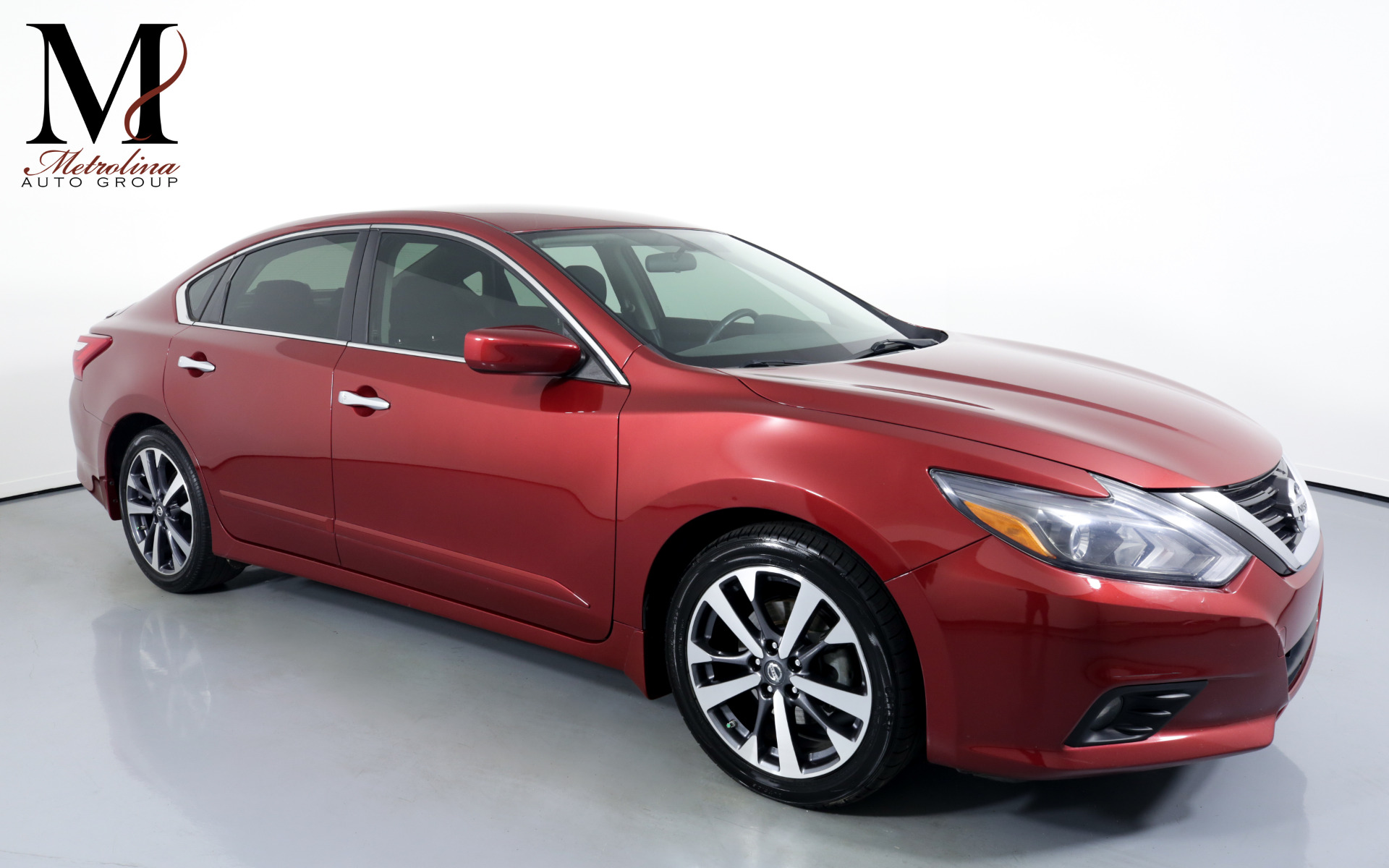Used 2016 Nissan Altima 2.5 SR for sale $11,996 at Metrolina Auto Group in Charlotte NC 28217 - 1