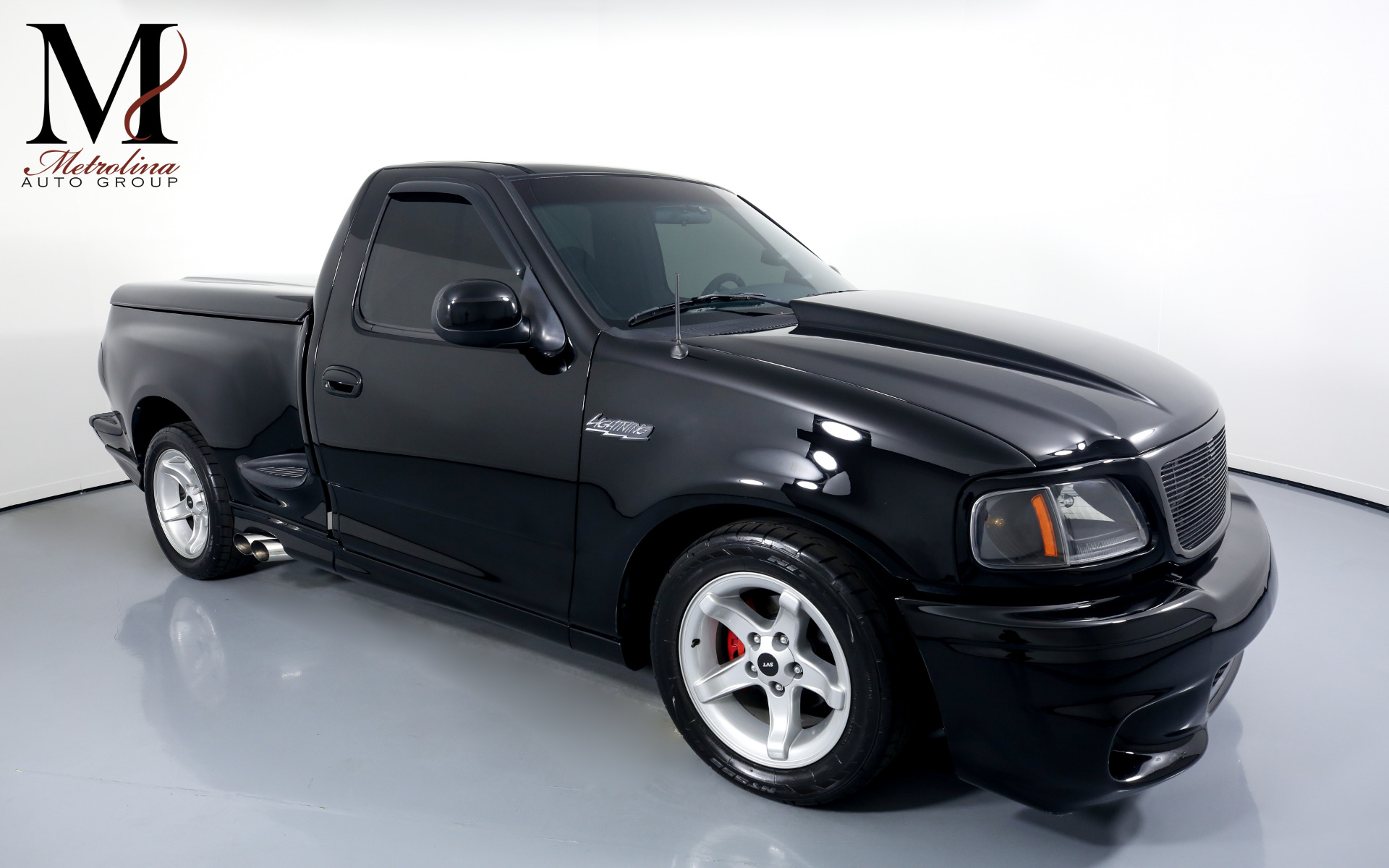 Used 2000 Ford F-150 SVT Lightning for sale $39,996 at Metrolina Auto Group in Charlotte NC 28217 - 1