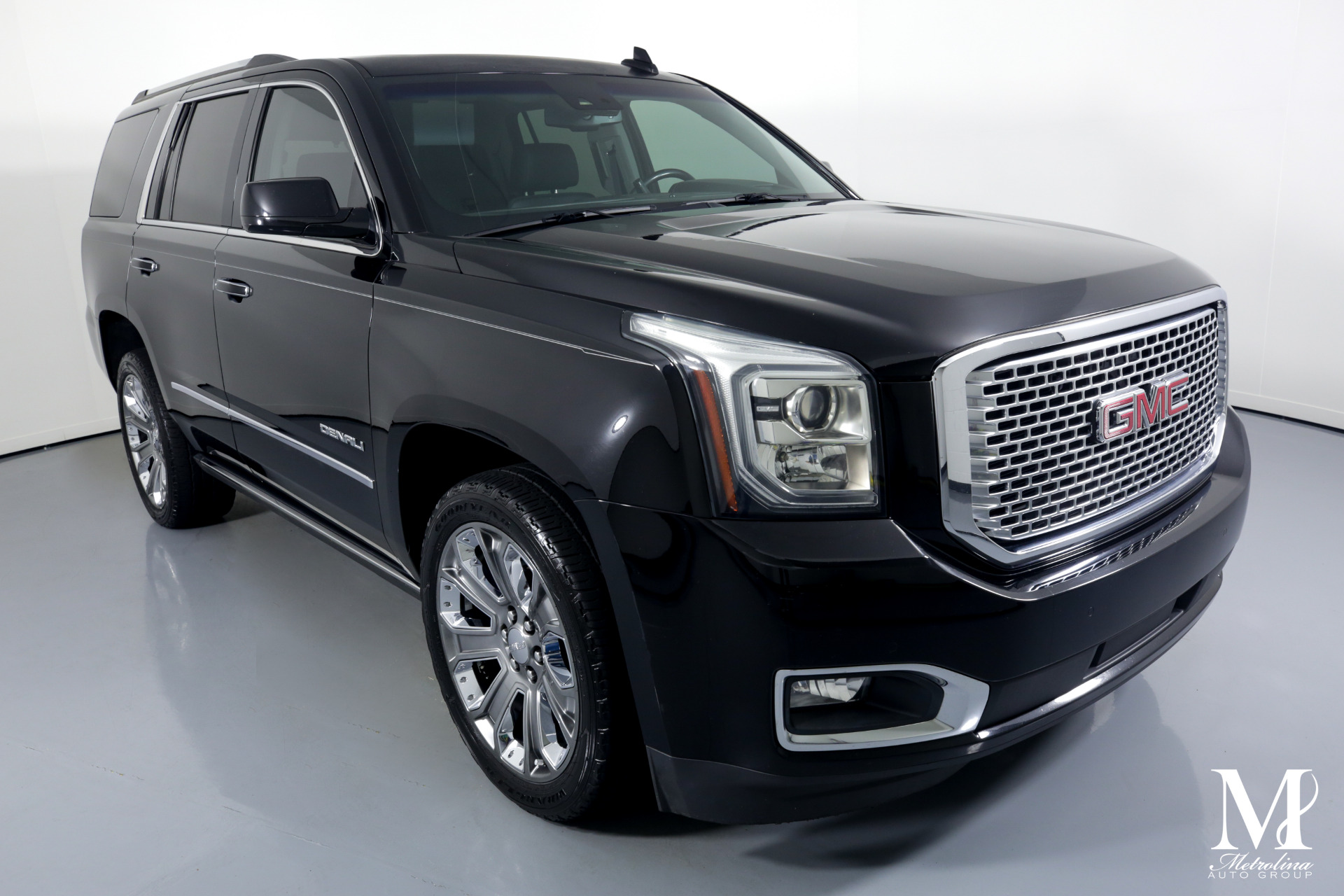 Used 2015 GMC Yukon Denali for sale $44,996 at Metrolina Auto Group in Charlotte NC 28217 - 2