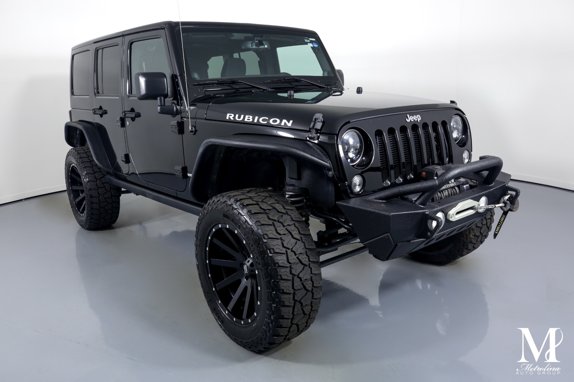 Used 2014 Jeep Wrangler Unlimited Rubicon for sale $44,996 at Metrolina Auto Group in Charlotte NC 28217 - 2