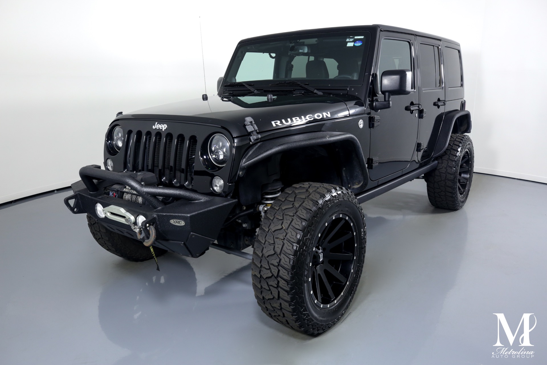 Used 2014 Jeep Wrangler Unlimited Rubicon for sale $44,996 at Metrolina Auto Group in Charlotte NC 28217 - 4