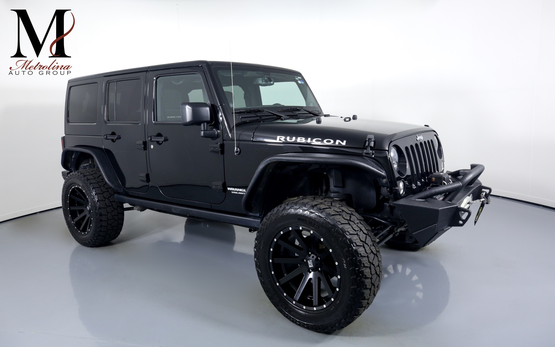 Used 2014 Jeep Wrangler Unlimited Rubicon for sale $44,996 at Metrolina Auto Group in Charlotte NC 28217 - 1