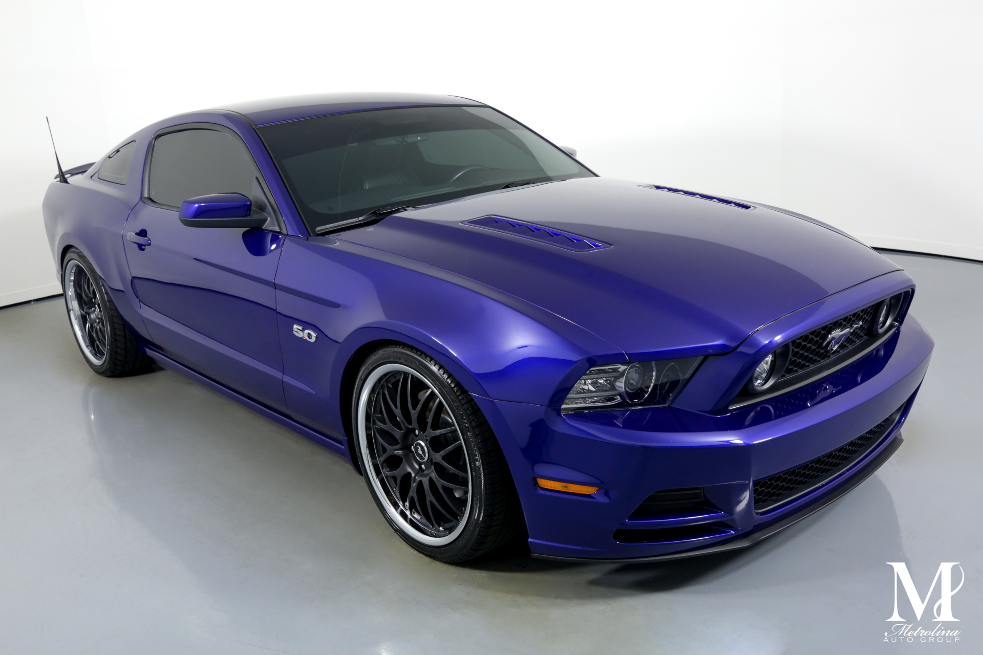 Used 2013 Ford Mustang GT Premium for sale $39,996 at Metrolina Auto Group in Charlotte NC 28217 - 2
