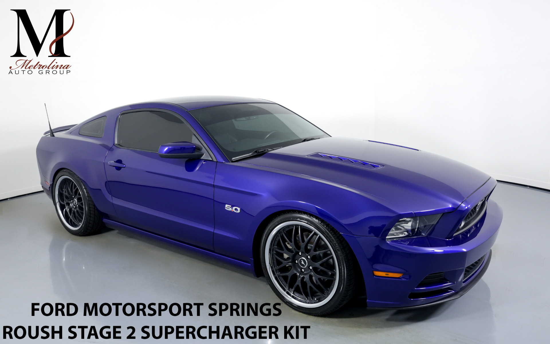 Used 2013 Ford Mustang GT Premium for sale $39,996 at Metrolina Auto Group in Charlotte NC 28217 - 1