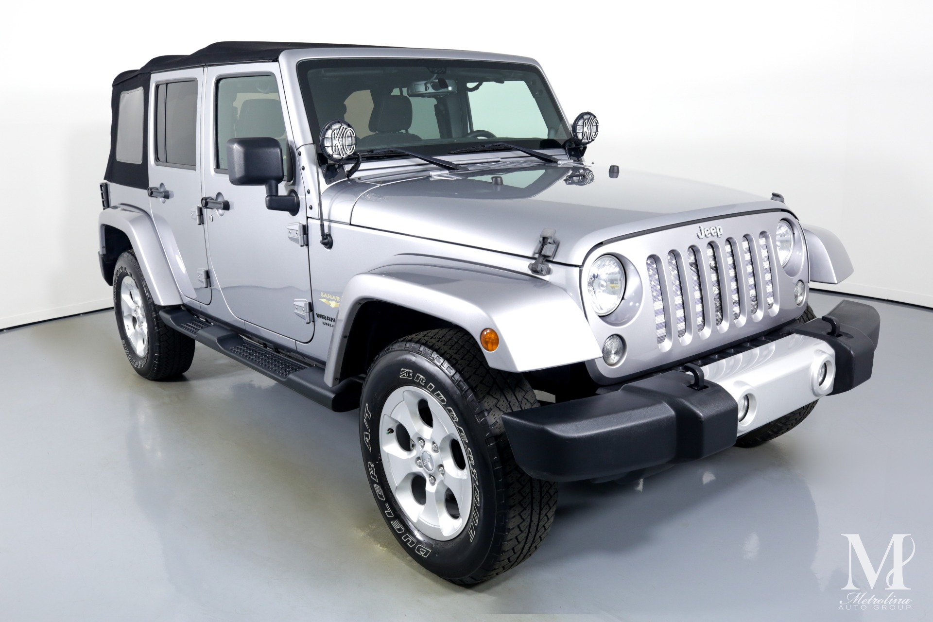 Used 2014 Jeep Wrangler Unlimited Sahara for sale Sold at Metrolina Auto Group in Charlotte NC 28217 - 2
