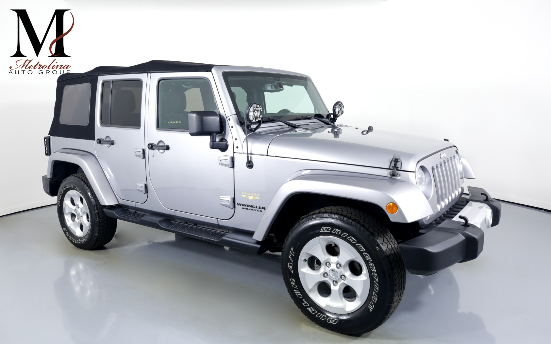 Used 2014 Jeep Wrangler Unlimited Sahara for sale Sold at Metrolina Auto Group in Charlotte NC 28217 - 1