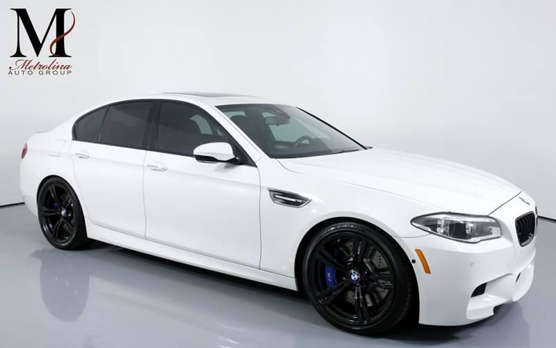 Used 2015 BMW M5 Base 4dr Sedan for sale Sold at Metrolina Auto Group in Charlotte NC 28217 - 1