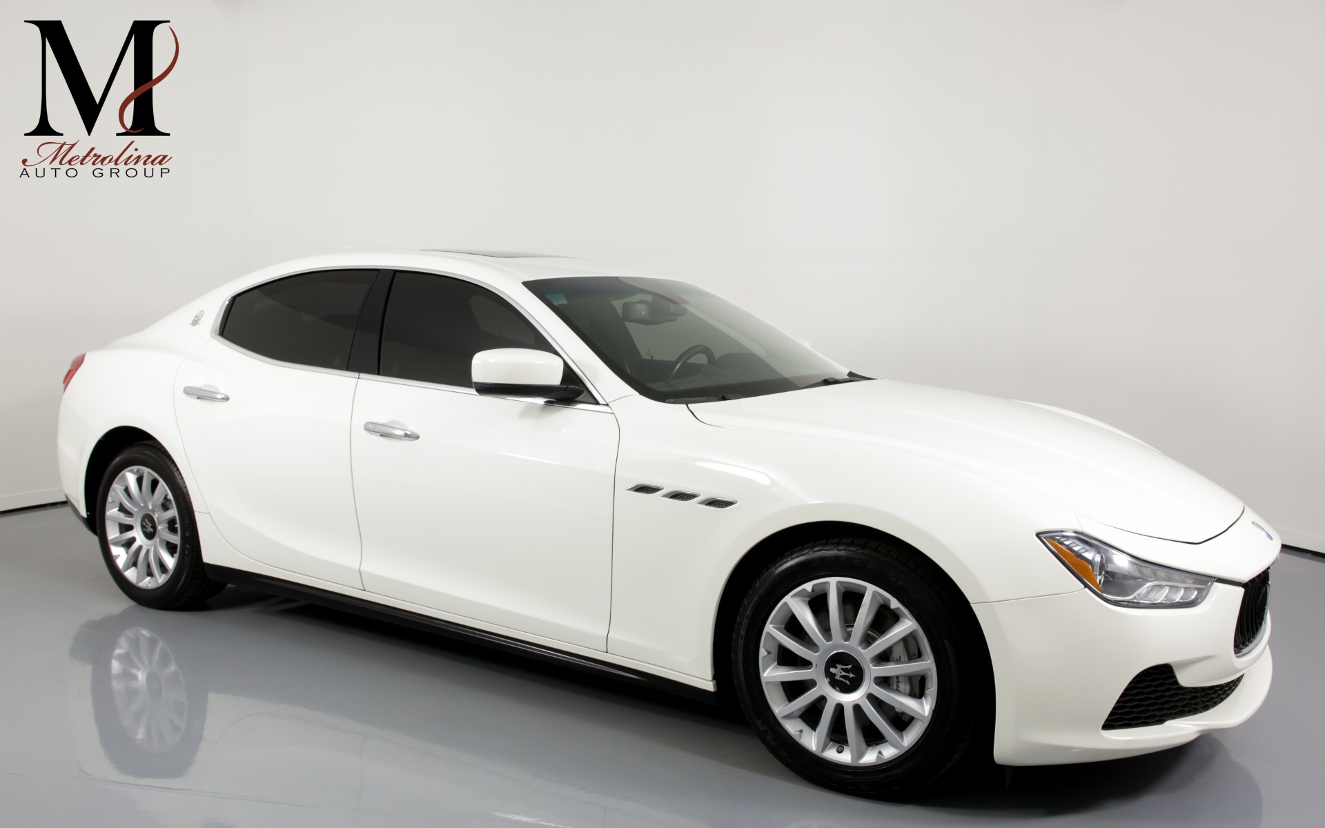 Used 2014 Maserati Ghibli Base 4dr Sedan for sale Sold at Metrolina Auto Group in Charlotte NC 28217 - 1