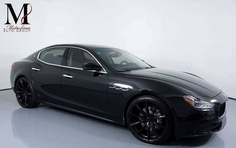 Used 2015 Maserati Ghibli Base 4dr Sedan for sale Sold at Metrolina Auto Group in Charlotte NC 28217 - 1