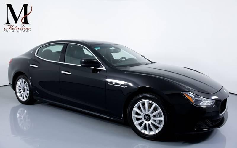 Used 2014 Maserati Ghibli Base 4dr Sedan for sale Sold at Metrolina Auto Group in Charlotte NC 28217 - 1